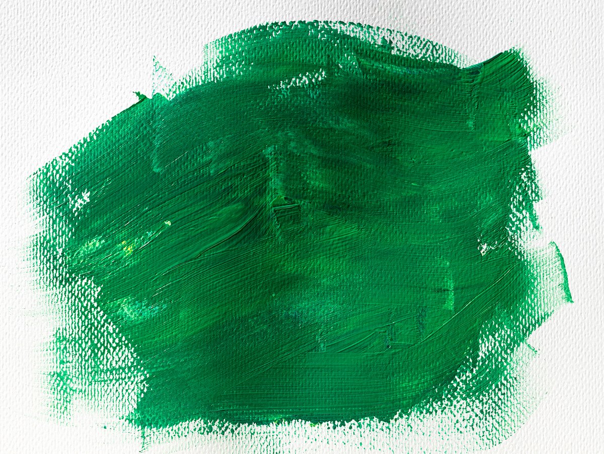 green paint on white canvas